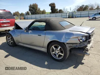 2003 Honda S2000 with VIN JHMAP11483T006461, listed as a Copart auction lot 52099995 with 187,376 mi miles and Salvage Title. Bid and sale history available at DreamBid. Image 2.