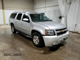 2013 Chevrolet Suburban LT with VIN 1GNSKJE76DR119873, listed as a Copart auction lot 53239445 with 197,172 mi miles and Salvage Title. Bid and sale history available at DreamBid. Image 14.