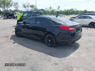 2013 Kia Optima SX with VIN 5XXGR4A61DG100479, listed as a IAAI auction lot 42376261 with 201,615 mi miles and . Bid and sale history available at DreamBid. Image 3.
