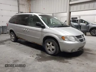 2005 Dodge Caravan SXT z VIN 2D4GP44L35R316403, wystawiony jako IAAI lot #42375328 z przebiegiem 179 299 mil mil oraz . Historia ofert i sprzedaży dostępna na DreamBid. Obrazek 1.