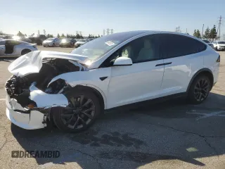 2023 Tesla Model X with VIN 7SAXCDE52PF378496, listed as a Copart auction lot 49455825 with Not Provided miles and Salvage Title. Bid and sale history available at DreamBid. Image 1.