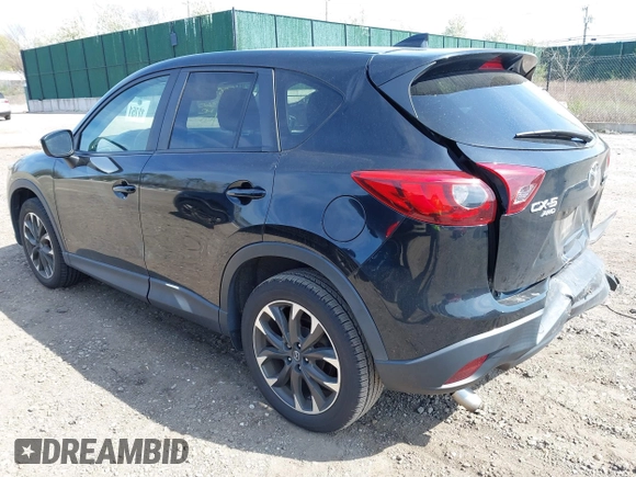 2016 Mazda CX-5 Grand Touring with VIN JM3KE4DY8G0639570, listed as a IAAI auction lot 42098512 with 126,541 mi miles and . Bid and sale history available at carsss.com. Image 3.