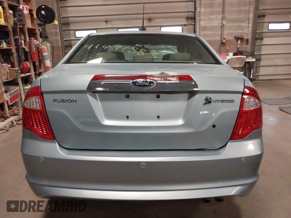 2010 Ford Fusion Hybrid z VIN 3FADP0L34AR276532, wystawiony jako IAAI lot #41491883 z przebiegiem 159 076 mil mil oraz . Historia ofert i sprzedaży dostępna na DreamBid. Obrazek 16.