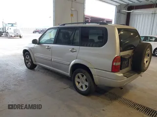 2003 Suzuki XL7 Touring z VIN JS3TX92V434101918, wystawiony jako IAAI lot #42750098 z przebiegiem 261 451 mil mil oraz . Historia ofert i sprzedaży dostępna na DreamBid. Obrazek 3.