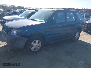2003 Ford Escape XLS Popular with VIN 1FMYU02133KA02990, listed as a IAAI auction lot 41803174 with 140,792 mi miles. Bid and sale history available at carsss.com. Image 16.