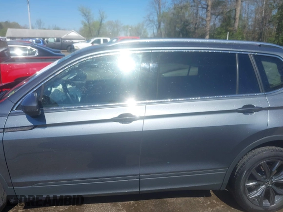 2022 Volkswagen Tiguan SE with VIN 3VV3B7AX1NM120097, listed as a IAAI auction lot 41967493 with 57,802 mi miles and . Bid and sale history available at DreamBid. Image 14.