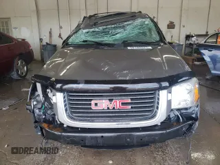 2005 GMC Envoy SLT z VIN 1GKDS13S152270398, wystawiony jako Copart lot #56160625 z przebiegiem 123 260 mil mil oraz Szkoda całkowita • Salvage title. Historia ofert i sprzedaży dostępna na DreamBid. Obrazek 5.