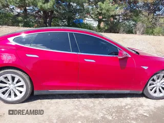 2014 Tesla Model S 60 with VIN 5YJSA1H11EFP37791, listed as a IAAI auction lot 41995504 with 84,371 mi miles and . Bid and sale history available at DreamBid. Image 13.