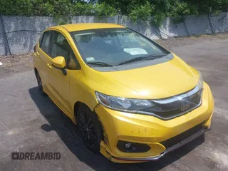 2018 Honda Fit Sport z VIN 3HGGK5H75JM715170, wystawiony jako IAAI lot #42449690 z przebiegiem 99 349 mil mil oraz . Historia ofert i sprzedaży dostępna na DreamBid. Obrazek 1.