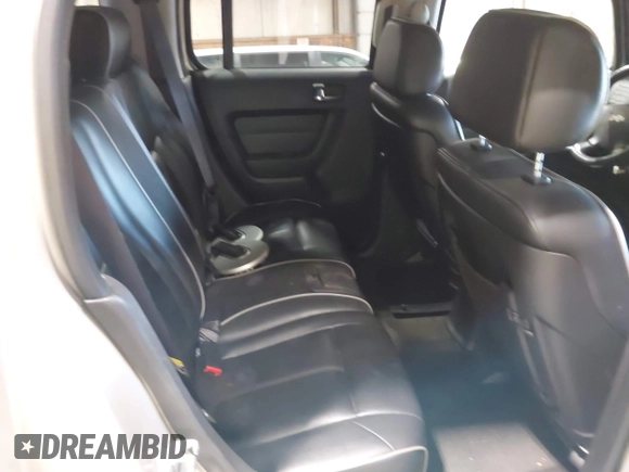 2006 Hummer H3 with VIN 5GTDN136268123052, listed as a IAAI auction lot 42126283 with 124,040 mi miles. Bid and sale history available at carsss.com. Image 8.