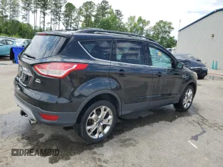 2013 Ford Escape SEL with VIN 1FMCU9HX0DUD23563, listed as a Copart auction lot 58691535 with 170,031 mi miles and Salvage title. Bid and sale history available at DreamBid. Image 3.