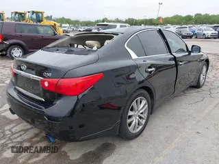 2015 Infiniti Q50 Premium with VIN JN1BV7AR8FM396828, listed as a IAAI auction lot 42313019 with 130,707 mi miles and . Bid and sale history available at DreamBid. Image 4.