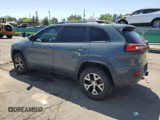 2014 Jeep Cherokee Trailhawk z VIN 1C4PJMBBXEW134939, wystawiony jako Copart lot #56579125 z przebiegiem 155 693 mil mil oraz Czysty tytuł • Clean title. Historia ofert i sprzedaży dostępna na DreamBid. Obrazek 2.