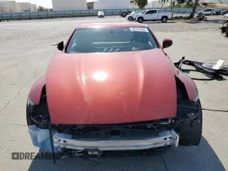 2013 Nissan 370Z Touring z VIN JN1AZ4EHXDM383169, wystawiony jako Copart lot #59787045 z przebiegiem 76 601 mil mil oraz Szkoda całkowita • Salvage title. Historia ofert i sprzedaży dostępna na DreamBid. Obrazek 5.