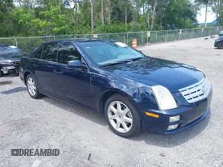 2005 Cadillac STS z VIN 1G6DW677350227666, wystawiony jako IAAI lot #42372958 z przebiegiem 158 389 mil mil oraz . Historia ofert i sprzedaży dostępna na DreamBid. Obrazek 1.