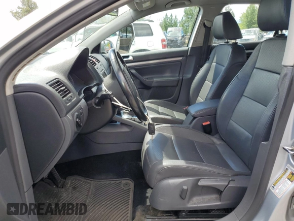 2009 Volkswagen Jetta SE with VIN 3VWRM71K99M156016, listed as a Copart auction lot 57711095 with 206,869 mi miles and Clean title. Bid and sale history available at DreamBid. Image 7.