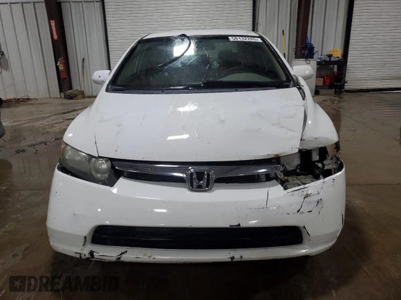 2006 Honda Civic LX z VIN 1HGFA16556L113760, wystawiony jako Copart lot #58132265 z przebiegiem 193 592 mil mil oraz Szkoda całkowita • Salvage title. Historia ofert i sprzedaży dostępna na DreamBid. Obrazek 5.