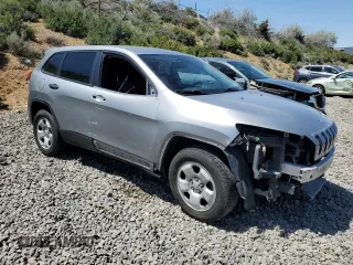 2015 Jeep Cherokee Sport with VIN 1C4PJMAB9FW545249, listed as a Copart auction lot 57528075 with 158,074 mi miles and Salvage title. Bid and sale history available at DreamBid. Image 4.