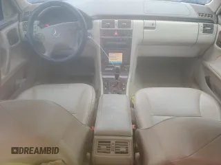 2002 Mercedes-Benz E 320 with VIN WDBJF82J22X070566, listed as a Copart auction lot 55964535 with 238,240 mi miles and Salvage Title. Bid and sale history available at DreamBid. Image 8.