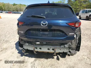 2019 Mazda CX-5 Grand Touring with VIN JM3KFBDMXK0540725, listed as a Copart auction lot 52395185 with 33,838 mi miles and Salvage Title. Bid and sale history available at carsss.com. Image 6.