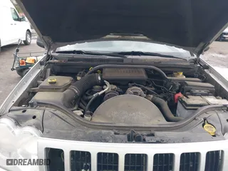 2005 Jeep Grand Cherokee Laredo with VIN 1J4GS48K75C644259, listed as a IAAI auction lot 42044878 with 250,841 mi miles. Bid and sale history available at carsss.com. Image 10.