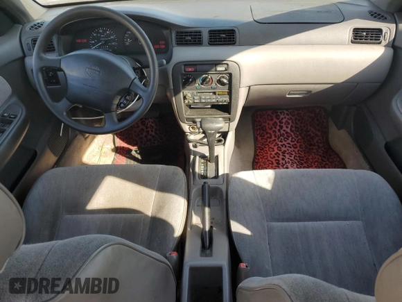 1996 Nissan Sentra XE z VIN 3N1AB41D3TL027288, wystawiony jako Copart lot #77255804 z przebiegiem 132 033 mil mil oraz Czysty tytuł • Clean title. Historia ofert i sprzedaży dostępna na DreamBid. Obrazek 8.