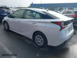 2019 Toyota Prius L Eco with VIN JTDKARFU7K3093038, listed as a IAAI auction lot 41768066 with 124,495 mi miles. Bid and sale history available at carsss.com. Image 3.