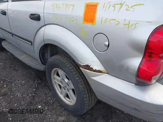 2007 Dodge Durango SLT z VIN 1D8HB48267F501204, wystawiony jako IAAI lot #41497256 z przebiegiem Nie podano mil oraz . Historia ofert i sprzedaży dostępna na DreamBid. Obrazek 6.