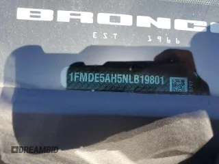 2022 Ford Bronco z VIN 1FMDE5AH5NLB19801, wystawiony jako Copart lot #58941495 z przebiegiem 7 759 mil mil oraz Szkoda całkowita • Salvage title. Historia ofert i sprzedaży dostępna na DreamBid. Obrazek 13.