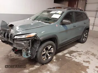 2015 Jeep Cherokee Trailhawk with VIN 1C4PJMBS6FW724931, listed as a IAAI auction lot 41602181 with 153,340 mi miles and . Bid and sale history available at carsss.com. Image 18.