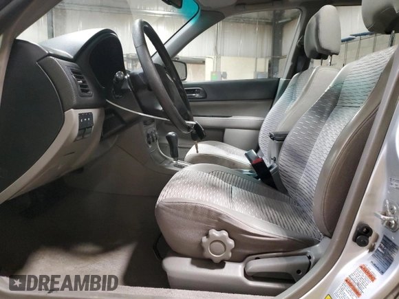 2003 Subaru Forester XS with VIN JF1SG65673H714885, listed as a Copart auction lot 74063684 with 298,649 mi miles and Salvage Title. Bid and sale history available at carsss.com. Image 7.