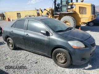2009 Toyota Yaris with VIN JTDBT903591336734, listed as a Copart auction lot 47306025 with 160,053 mi miles and Salvage Title. Bid and sale history available at carsss.com. Image 4.