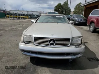 1999 Mercedes-Benz SL 500 z VIN WDBFA68F3XF178333, wystawiony jako Copart lot #49852355 z przebiegiem 177 939 mil mil oraz Szkoda całkowita • Salvage title. Historia ofert i sprzedaży dostępna na DreamBid. Obrazek 5.