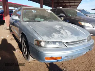 1995 Honda Accord EX w/Leather with VIN 1HGCD5663SA033194, listed as a IAAI auction lot 40946495 with 259,023 mi miles. Bid and sale history available at carsss.com. Image 1.