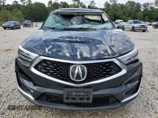 2020 Acura RDX Technology with VIN 5J8TC1H50LL004046, listed as a Copart auction lot 54356915 with 50,218 mi miles and Salvage title. Bid and sale history available at DreamBid. Image 5.