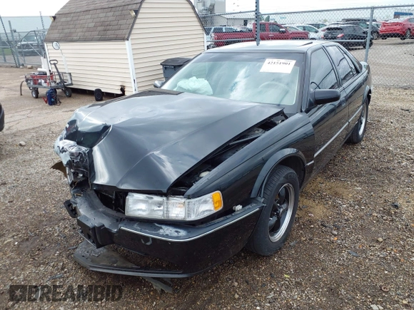 1994 Cadillac Seville STS z VIN 1G6KY5296RU823387, wystawiony jako IAAI lot #42151901 z przebiegiem 165 918 mil mil oraz . Historia ofert i sprzedaży dostępna na DreamBid. Obrazek 18.