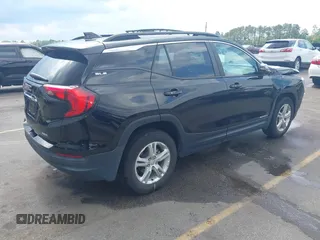 2021 GMC Terrain SLE z VIN 3GKALTEV5ML345992, wystawiony jako IAAI lot #42467280 z przebiegiem 123 704 mil mil oraz . Historia ofert i sprzedaży dostępna na DreamBid. Obrazek 4.