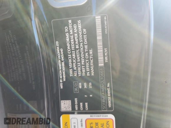 2021 Aston Martin DB11 V8 z VIN SCFRMFAW6MGL10668, wystawiony jako Copart lot #79014154 z przebiegiem Nie podano mil oraz Szkody całkowita. Historia ofert i sprzedaży dostępna na DreamBid. Obrazek 13.