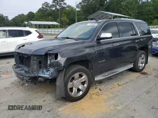 2015 Chevrolet Tahoe LTZ with VIN 1GNSCCKC2FR185009, listed as a Copart auction lot 57505865 with 142,894 mi miles and Salvage title. Bid and sale history available at DreamBid. Image 1.