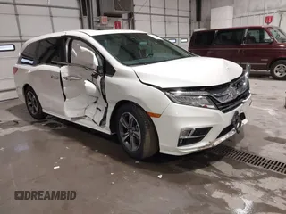 2019 Honda Odyssey Touring with VIN 5FNRL6H83KB051363, listed as a IAAI auction lot 41173587 with 88,512 mi miles. Bid and sale history available at carsss.com. Image 1.
