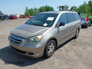 2005 Honda Odyssey EX-L with VIN 5FNRL38755B107829, listed as a IAAI auction lot 42422225 with 227,008 mi miles and . Bid and sale history available at DreamBid. Image 2.