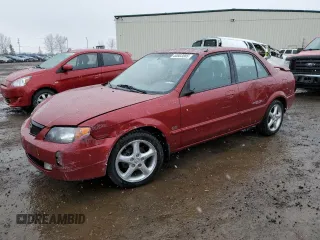 2002 Mazda Protege DX z VIN JM1BJ225820506043, wystawiony jako Copart lot #53803085 z przebiegiem 123 967 mil mil oraz Szkoda całkowita • Salvage title. Historia ofert i sprzedaży dostępna na DreamBid. Obrazek 1.