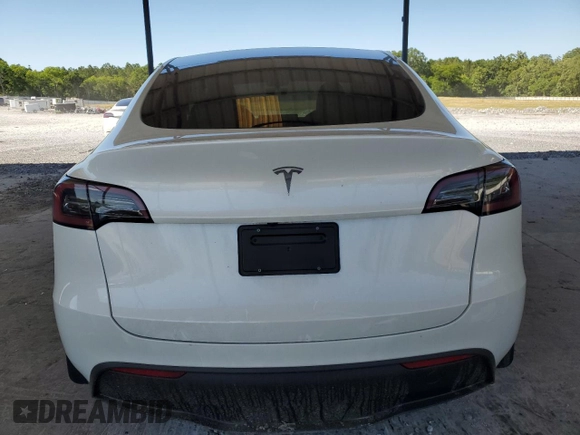 2024 Tesla Model Y с VIN 7SAYGDED5RF086456, выставлен на аукционе Copart как лот 57994835 с пробегом Не указан миль и Списание • Salvage title. История ставок и продаж доступна на DreamBid. Изображение 6.