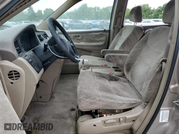 2003 Honda Odyssey EX z VIN 5FNRL186X3B152340, wystawiony jako Copart lot #57883455 z przebiegiem 214 008 mil mil oraz Szkoda całkowita • Salvage title. Historia ofert i sprzedaży dostępna na DreamBid. Obrazek 7.