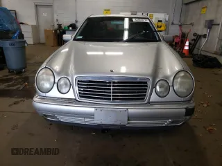 1999 Mercedes-Benz E-Class with VIN WDBJF82H4XX021888, listed as a Copart auction lot 83069274 with 173,198 mi miles and Salvage Title. Bid and sale history available at carsss.com. Image 5.