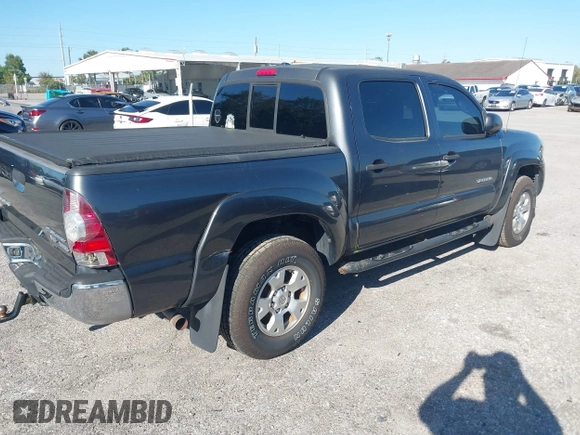2009 Toyota Tacoma PreRunner with VIN 3TMJU62N59M088137, listed as a IAAI auction lot 41775410 with 217,331 mi miles. Bid and sale history available at carsss.com. Image 4.
