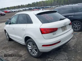 2017 Audi Q3 Premium z VIN WA1BCCFS2HR009908, wystawiony jako IAAI lot #41867249 z przebiegiem 116 804 mil mil oraz . Historia ofert i sprzedaży dostępna na DreamBid. Obrazek 3.