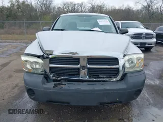 2005 Dodge Dakota ST with VIN 1D7HE22K25S119460, listed as a IAAI auction lot 41790592 with 104,995 mi miles and . Bid and sale history available at DreamBid. Image 6.