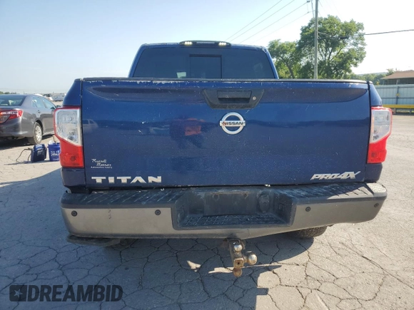 2017 Nissan Titan Pro-4X with VIN 1N6AA1E5XHN544948, listed as a Copart auction lot 61851175 with 216,797 mi miles and Clean title. Bid and sale history available at DreamBid. Image 6.