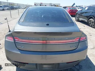 2014 Lincoln MKZ z VIN 3LN6L2G92ER835456, wystawiony jako IAAI lot #41985573 z przebiegiem 174 080 mil mil oraz . Historia ofert i sprzedaży dostępna na DreamBid. Obrazek 16.